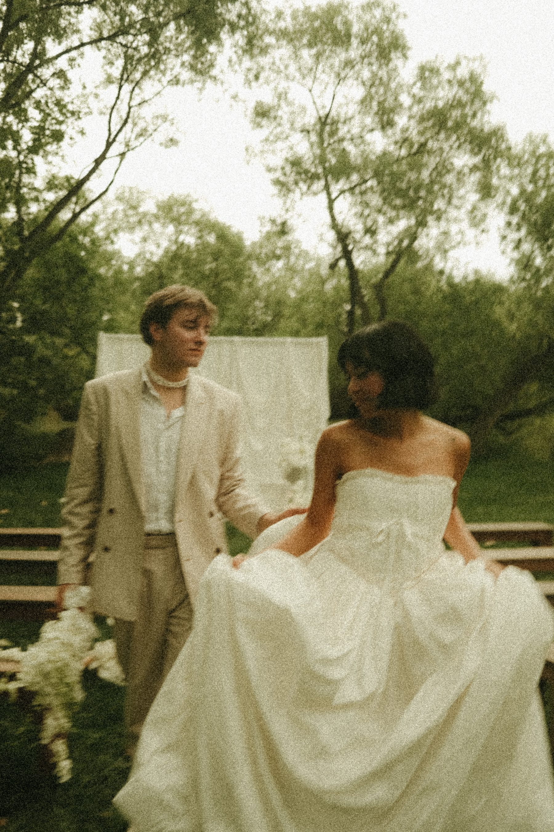 Editorial wedding portrait, warm cream tones