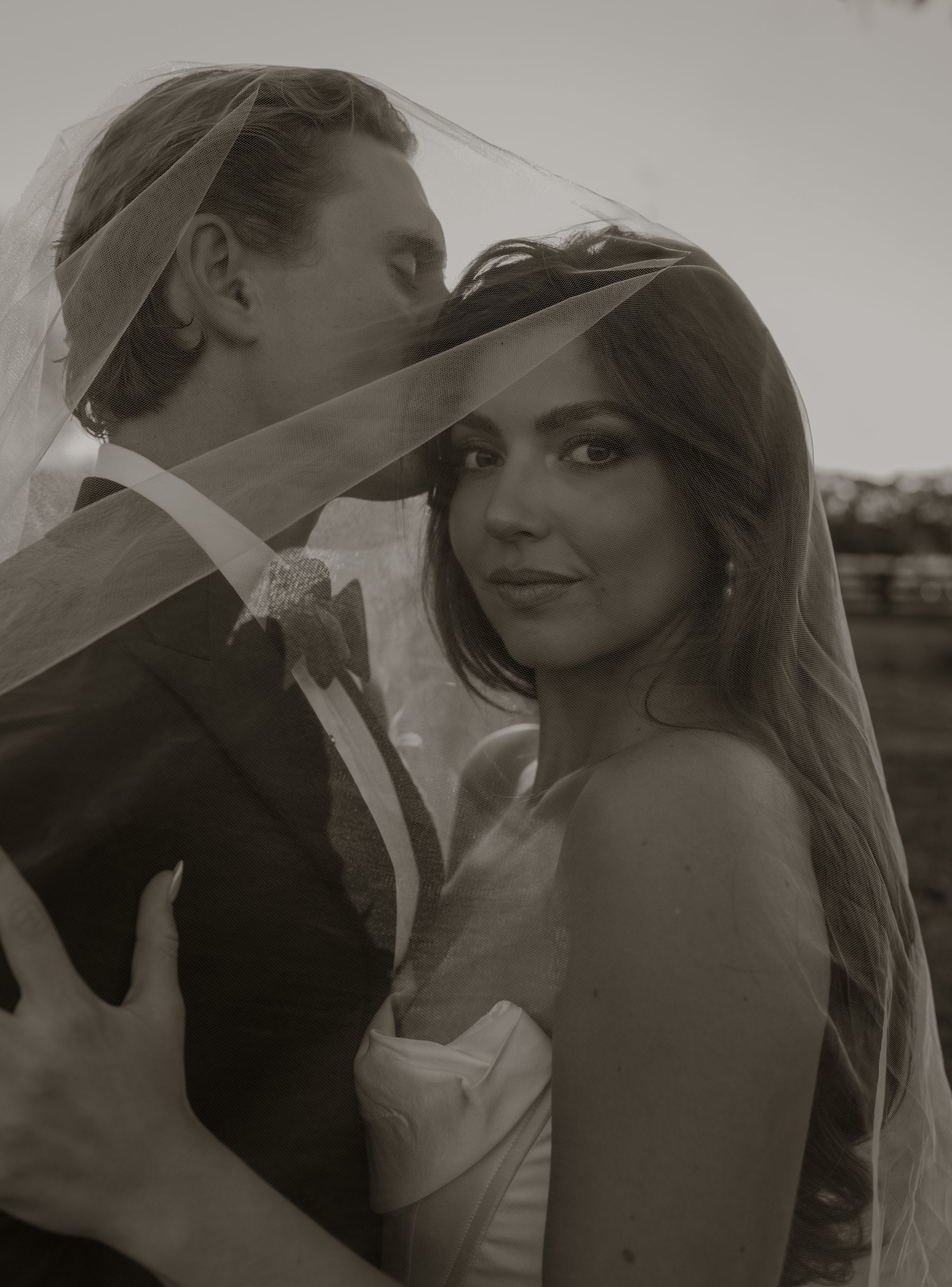 Same photo with Sombra preset applied — warm black and white